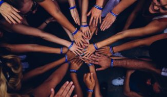 Hands Huddling Successful Fundraiser